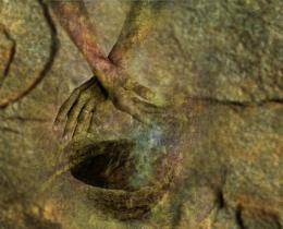 Abstract image of hands over a healing bowl blended with rock textures, representing ancient spiritual practices and the root causes of soul illness such as disharmony, fear, and soul loss.