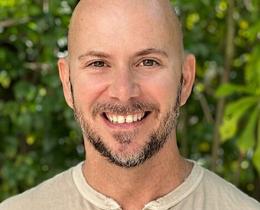 Adrian Molina is a writer, trauma-informed coach, yoga teacher, and end-of-life doula.