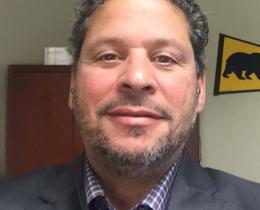 Omega faculty Curtiss Sarikey