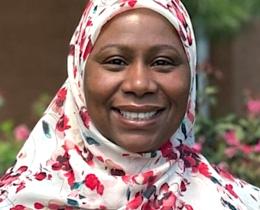Nzinga Abdullah-Aziz, a certified hospice and palliative care nurse, supports others through life and end-of-life transitions.