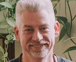 Scott MacPhie is a yoga teacher.