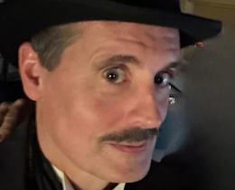 Scott Woolley is an actor with Murder Cafe