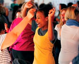 Participants dancing at an Omega workshop