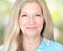 Omega faculty Austyn Wells