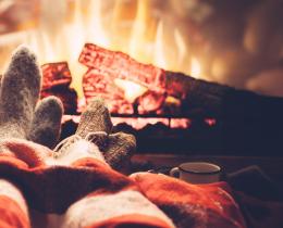 Sitting in front of a fire wearing cozy socks