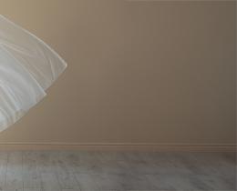 Curtain blowing in the breeze with dramatic light coming through, showing intuition in day-to-day life.