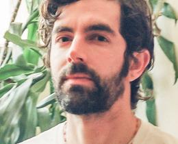 Omega faculty Luke Simon