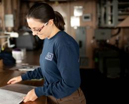 Marisol Maddox looking over notes