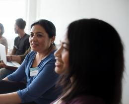Group of healing practitioners in a professional training workshop.