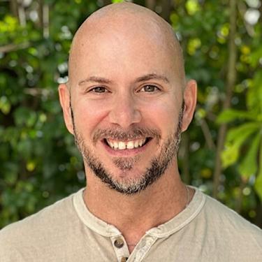 Adrian Molina is a writer, trauma-informed coach, yoga teacher, and end-of-life doula.