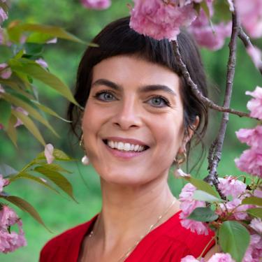 Fru Molnar is the founder of Forest Baths, a lifelong student of the forest, and a certified forest therapy guide