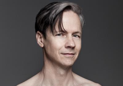 Headshot of John Cameron Mitchell