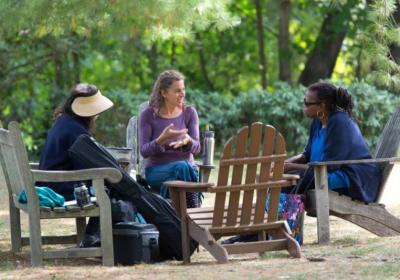 People sitting outside in a circle