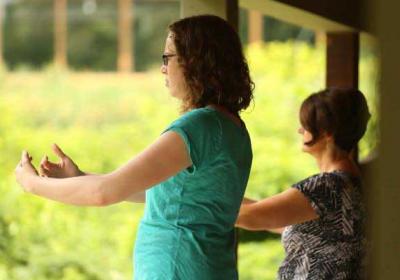 Two people doing chi gung