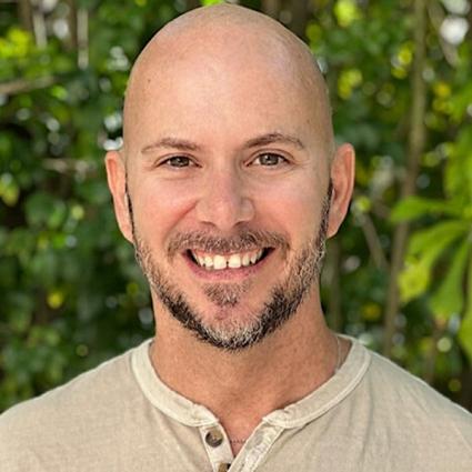 Adrian Molina is a writer, trauma-informed coach, yoga teacher, and end-of-life doula.