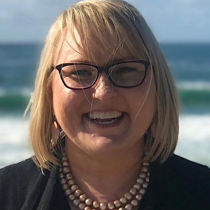 Angela Schellenberg is a licensed psychotherapist specializing in grief, trauma, and attachment.