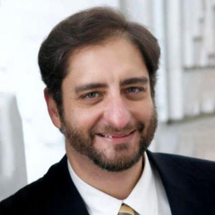 Omega faculty Carlos Monteagudo