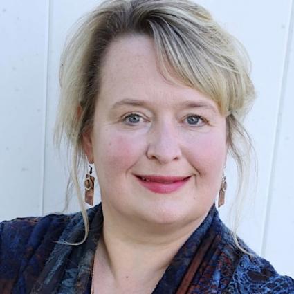 Carmen Turner-Schott is an astrologer, clinical social worker, and best-selling author.