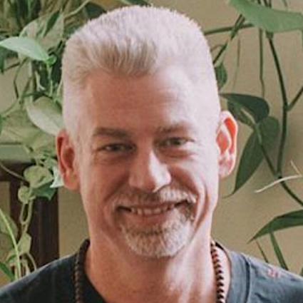 Scott MacPhie is a yoga teacher.