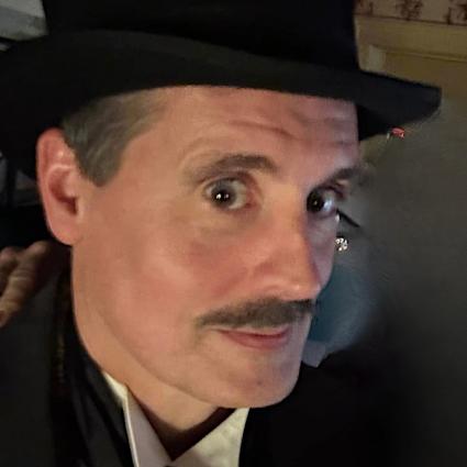 Scott Woolley is an actor with Murder Cafe