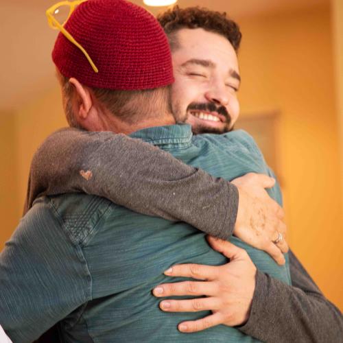 2 men hugging