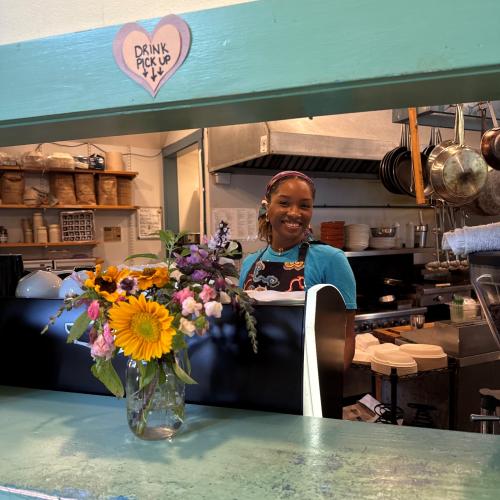 Cafe server at counter