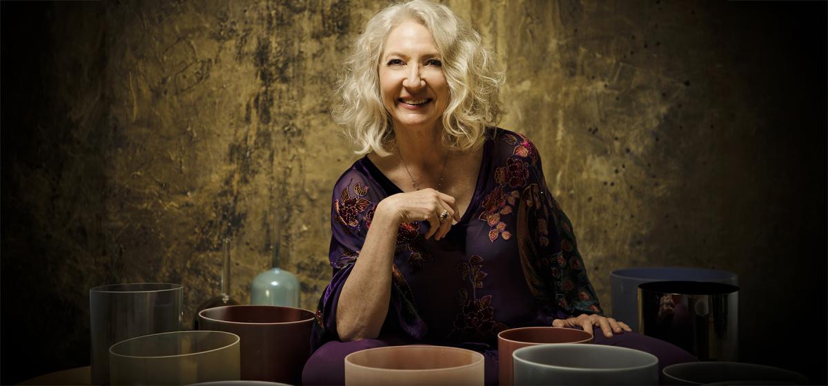 Ashana with a collection of singing bowls