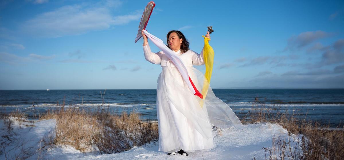 Helena Soholm standing in a snowy field