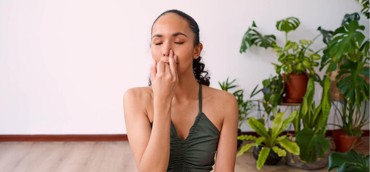 Woman doing breathwork exercise