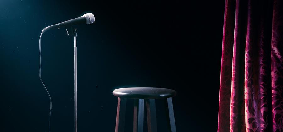 Microphone and stool on stage