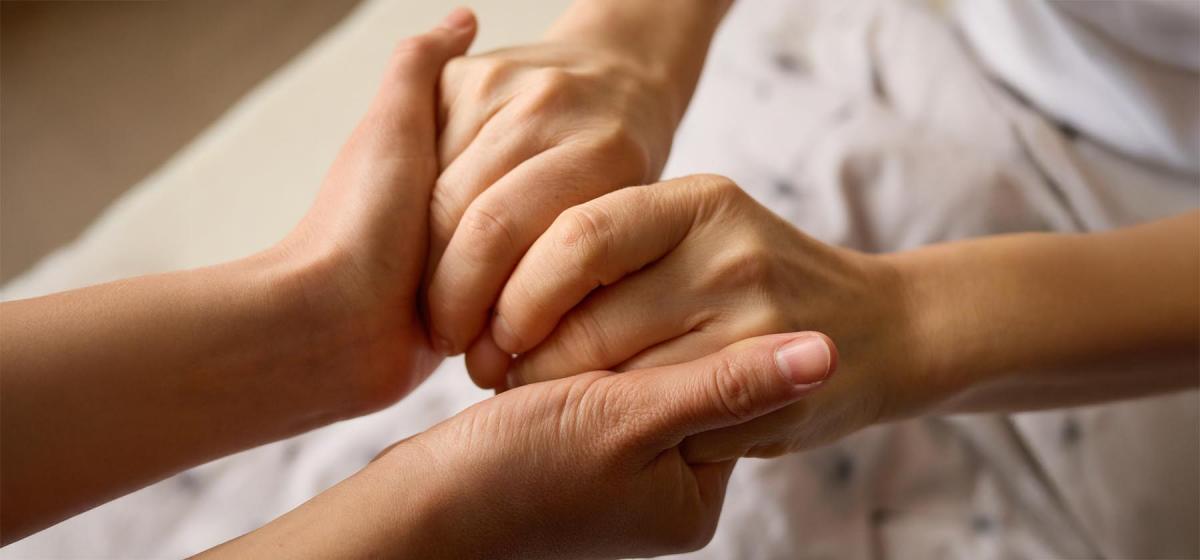 Couple holding hands