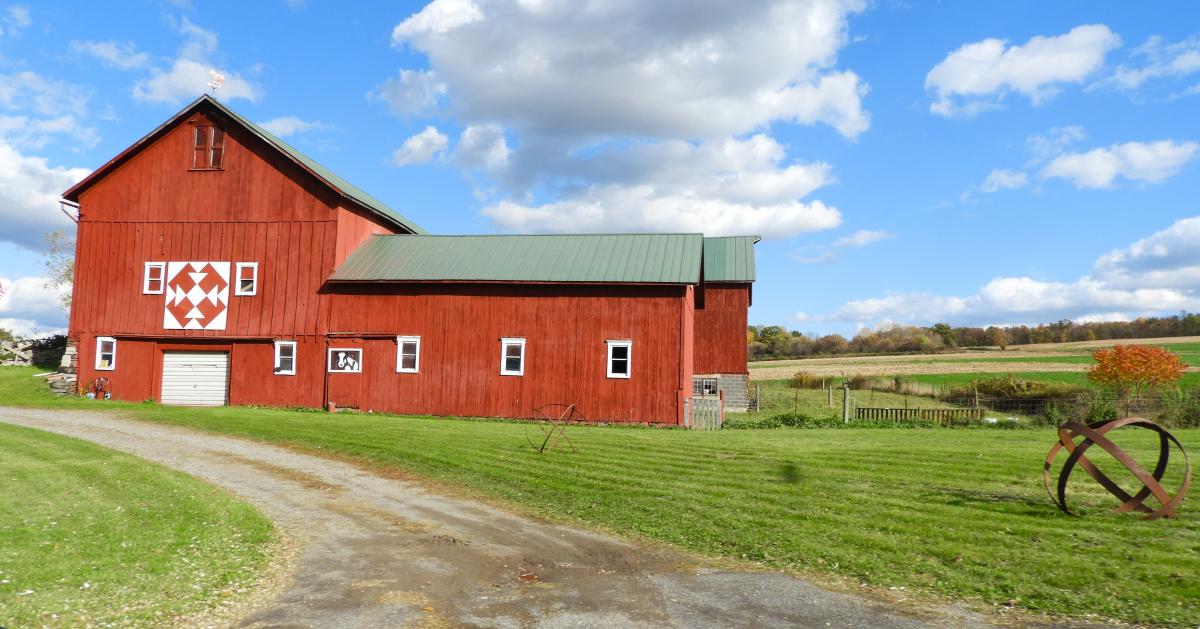 Red barn and agricultural fields