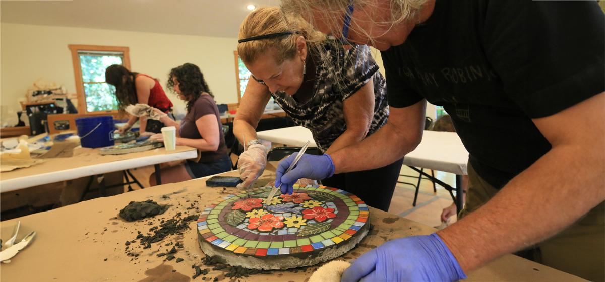 Participants making mosaics with Suzi Edwards