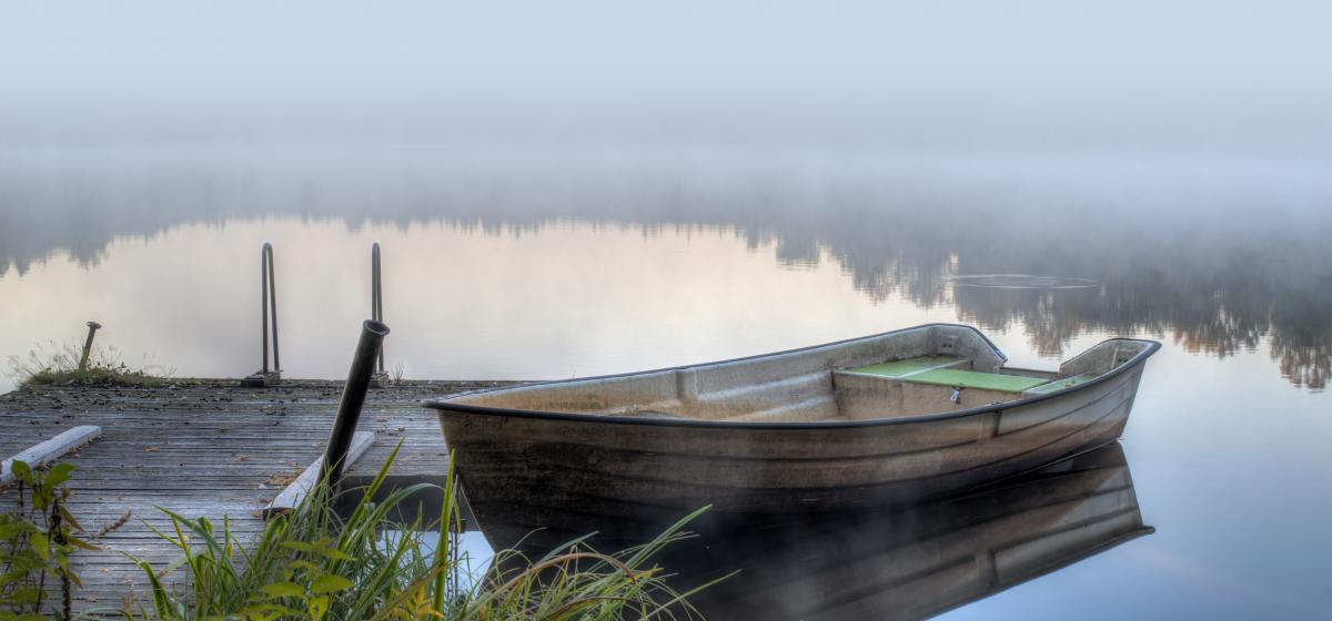 Rowboat in the fog
