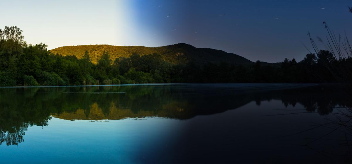 Landscape with daytime on one side, nighttime on the other