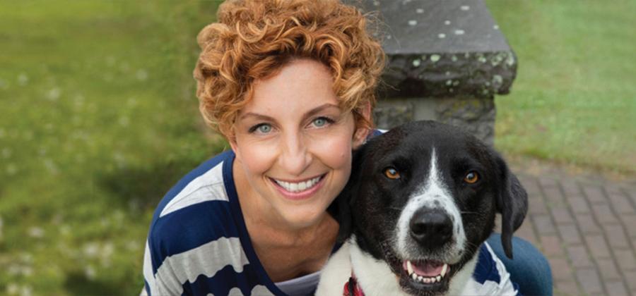 Omega faculty Danielle MacKinnon with a cute dog