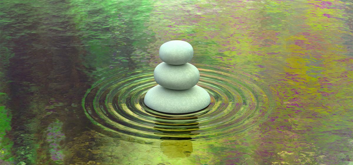 Stacked stones in a pool of water