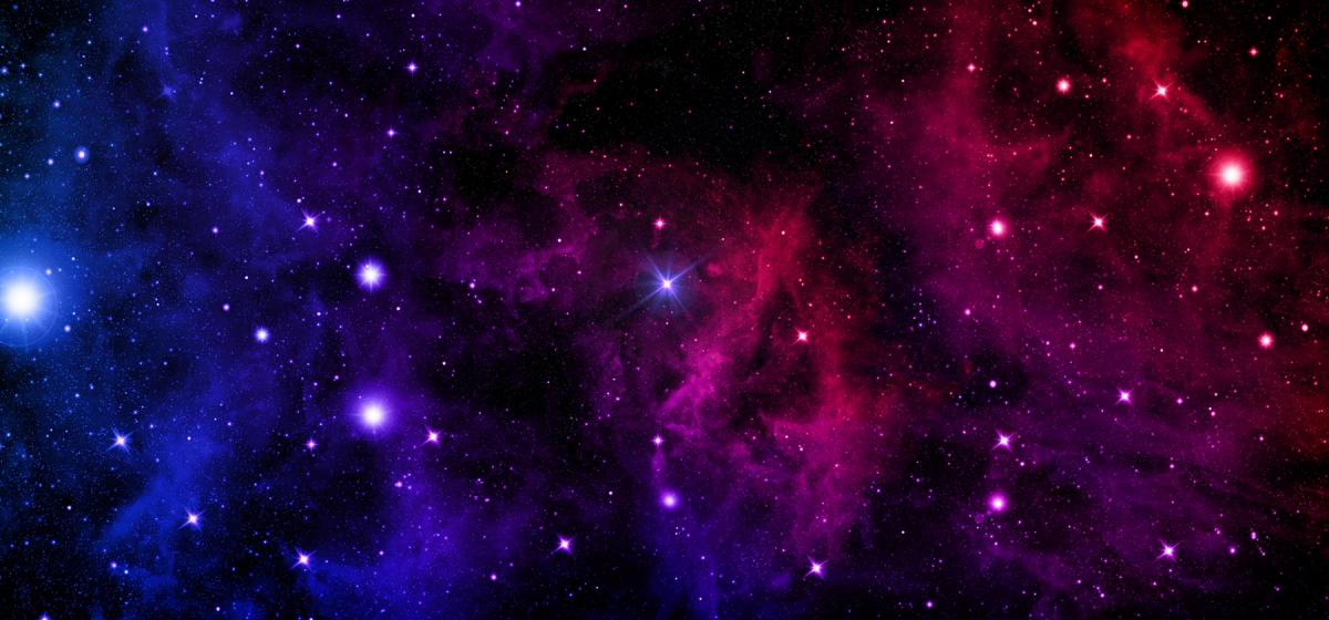 Night sky with constellations and brightly colored clouds