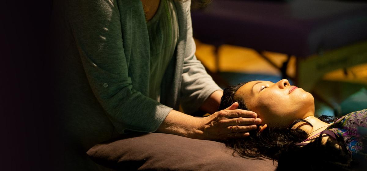 Woman receiving Reiki