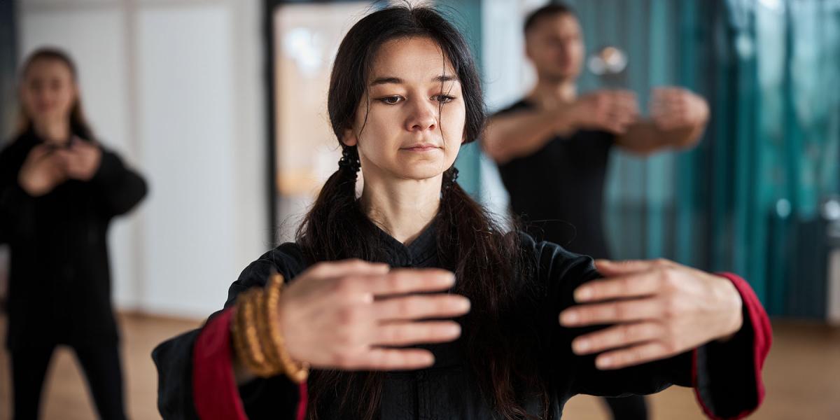 Group of people in tai chi class