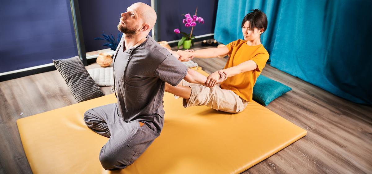 Person receiving a Thai Massage