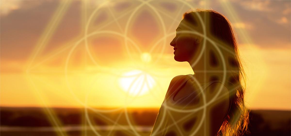 Woman with sacred geometry symbols