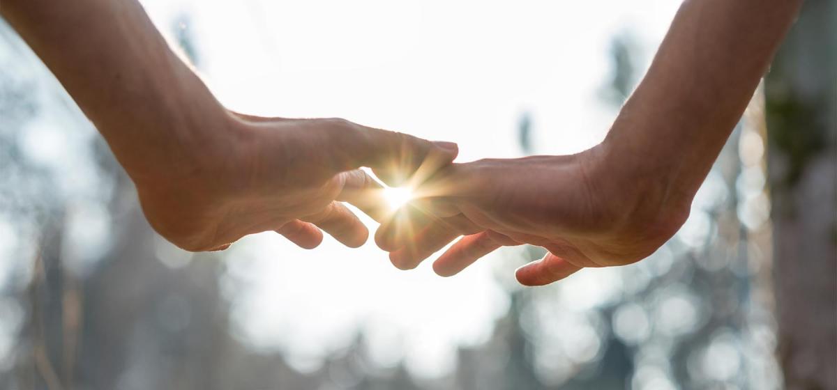 Hands in front of light