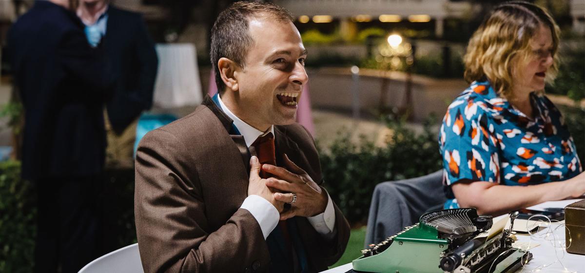 Elisabeth and Philip Nails typing on typewriters