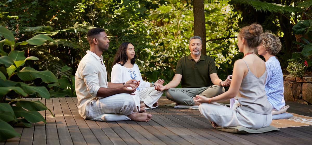 Group of people meditating together