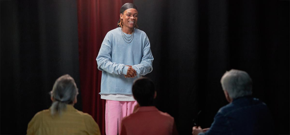 Person telling a story in a workshop