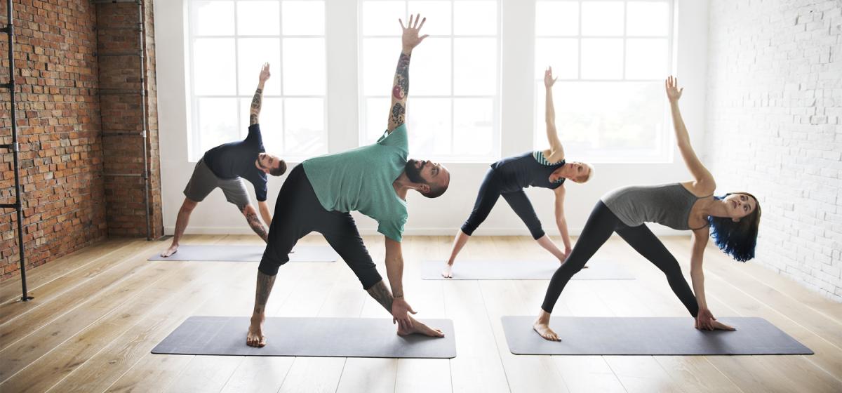 Group of people in yoga class