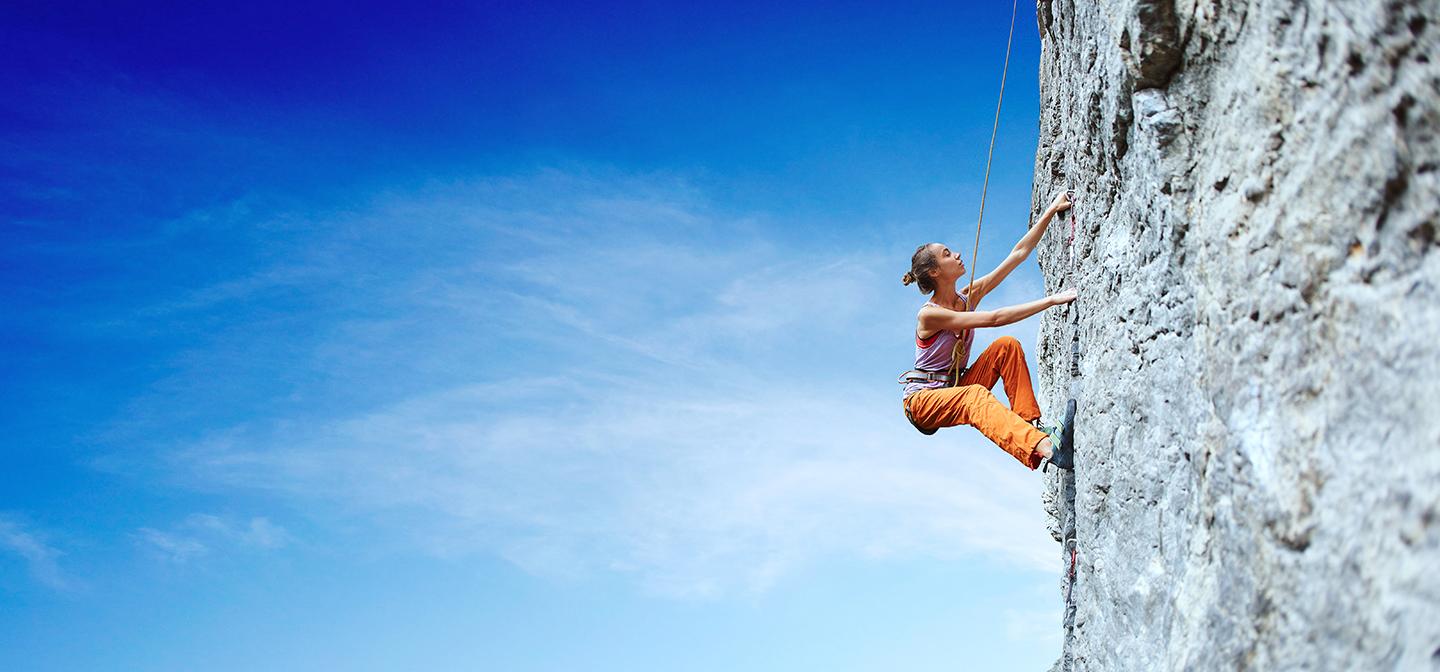 Woman rock climbing