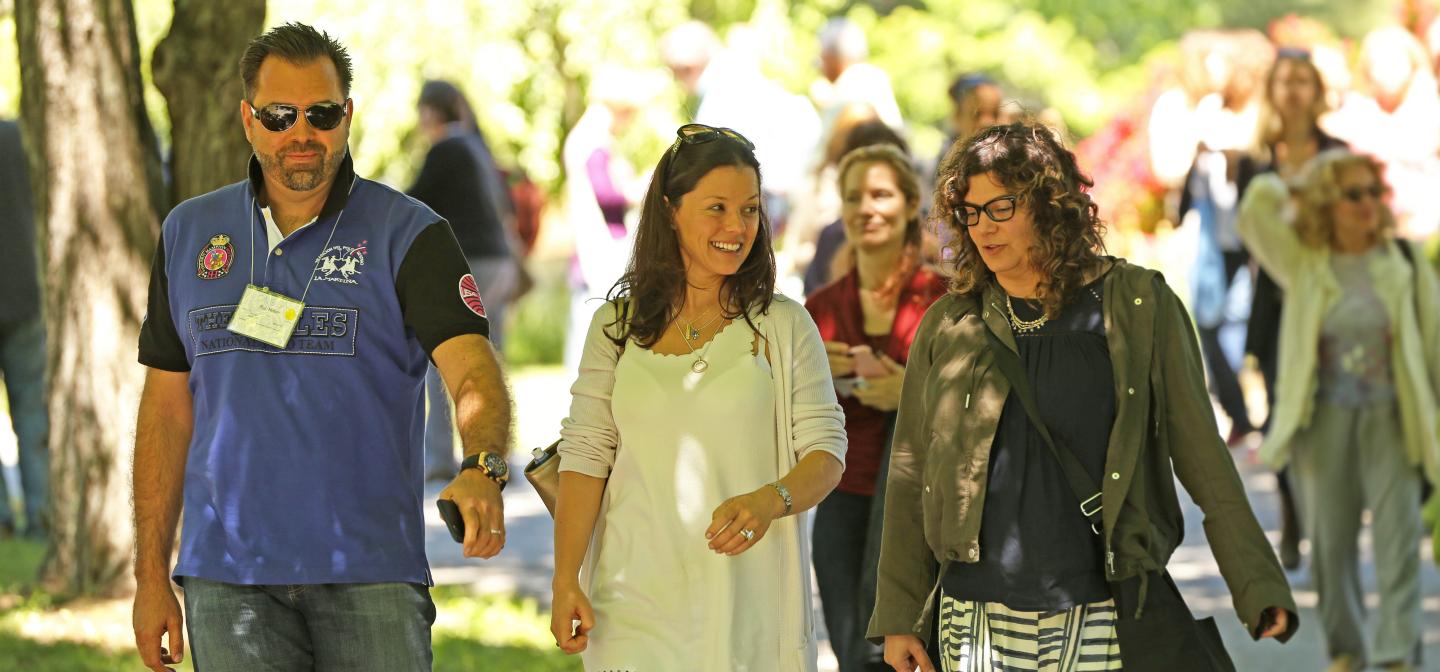 Guests walking around Omega's campus