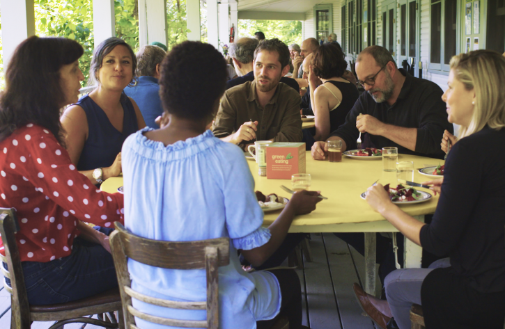 Sharing a meal on the porch of the dining hall